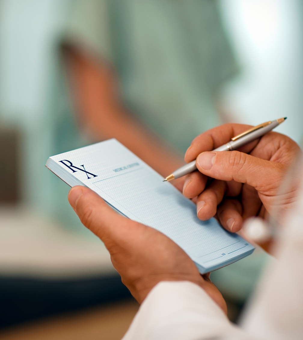 doctor writing a prescription