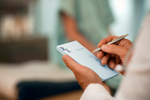 doctor writing a prescription