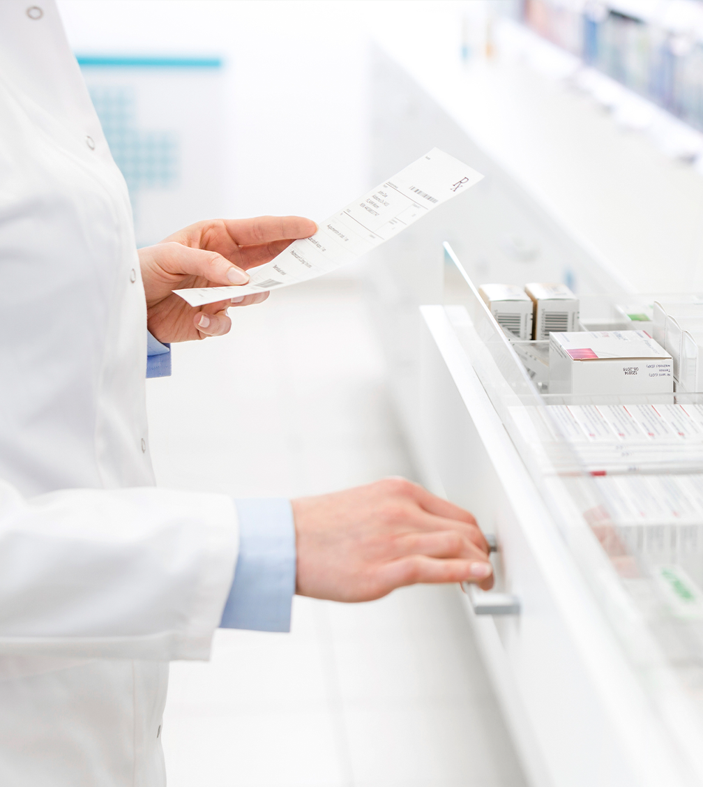 pharmacist reading prescription