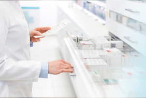 pharmacist reading prescription