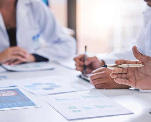 Benefits and implementation teams reviewing a PBM transition plan, data requirements and go-live responsibilities before an employer pharmacy benefit launch.