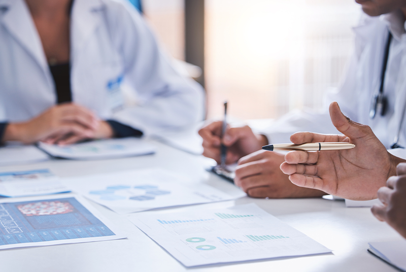 Benefits and implementation teams reviewing a PBM transition plan, data requirements and go-live responsibilities before an employer pharmacy benefit launch.