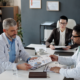 Benefits professionals reviewing pharmacy benefit contract terms, data access and implementation requirements to assess how much control employers have over their PBM strategy.
